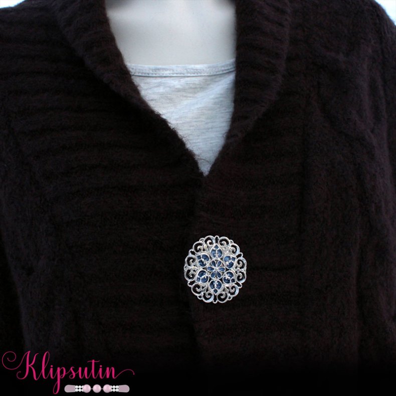 Klipsutin Carla-Slvblomst med bl dekoration