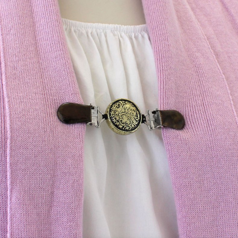 Klipsutin Minka-Guldknap med sorte clips